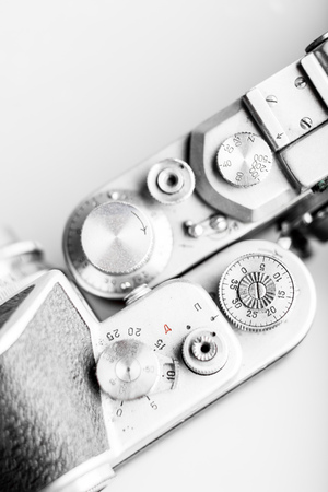 Analog camera shutter speed limb. Top view of two camerasの写真素材