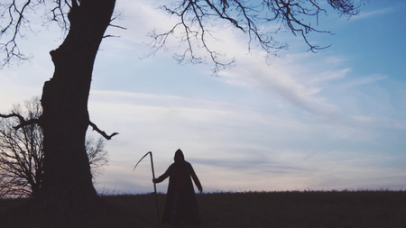 Grim Reaper sunset silhouette. concept of death. Soft focusの写真素材