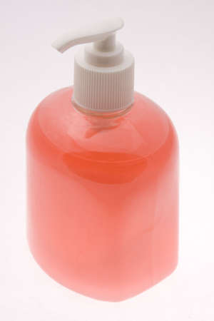 Bottle filled with red liquid soapの写真素材