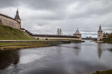 View of the Pskov Kremlin from the Pskov river. Spring cloudy day. Pskov.の写真素材