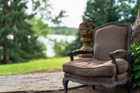 Vintage sofa. Decoration vintage armchair in the forest