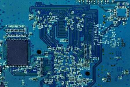 Electronic circuit board with chip, resistors and capacitors