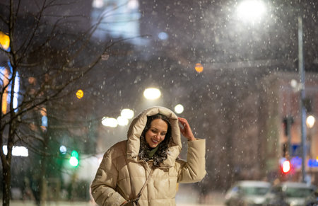 It's snowing in the city at nightの写真素材