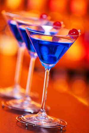 Blue cosmopolitan on a barの写真素材