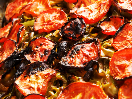 Iman Bayildi - the most popular turkish vegetarian dish made of braised eggplant, onion, peppers, garlic and tomatoes.の写真素材