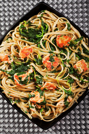 Fettuccine with salmon and spinachの写真素材