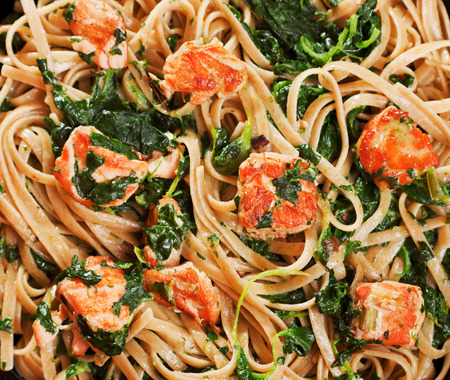 Fettuccine with salmon and spinach, close upの写真素材