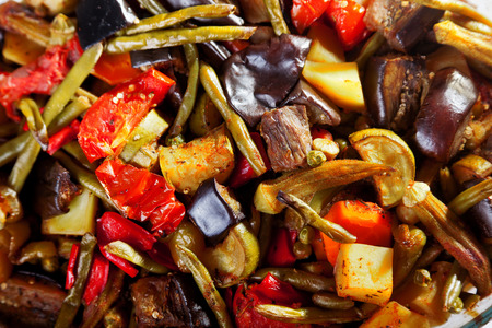 Casserole with eggplants, potatoes, tomatoes, okra and zuchinniの写真素材