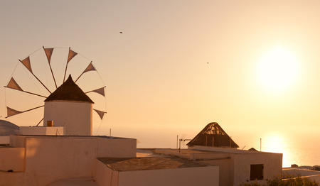 Windmill in Oia, Santorini during a sunny summer day