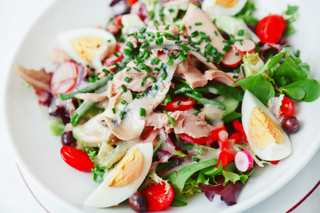 Nicoise Salad served in a restaurant in Cannes, Franceの写真素材