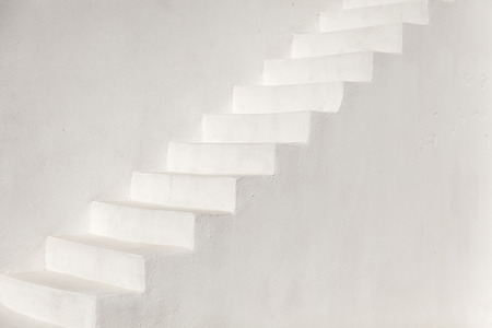 White stairs on a church wall in Oia, Santoriniの写真素材