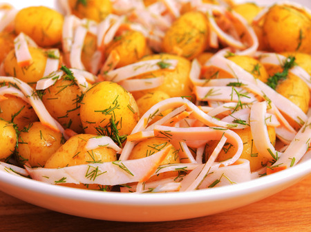 Fried baby potatoes with baconの写真素材