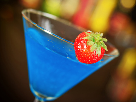 Blue curacao pernod cocktail on a barの写真素材