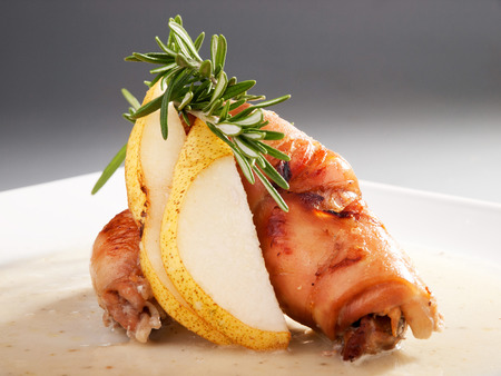 Stuffed chicken rolls with nuts and pearsの写真素材