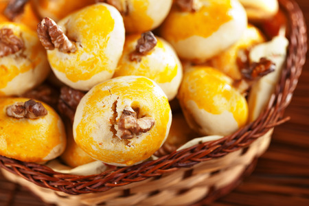 Cookies with walnuts in a basketの写真素材