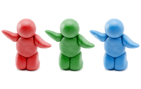 Clay people presenting three colors - red, green and blueの写真素材