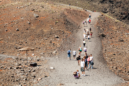 Fira, Greece - May 04, 2012 : Tourists walking near the crater in Nea Kameniのeditorial素材