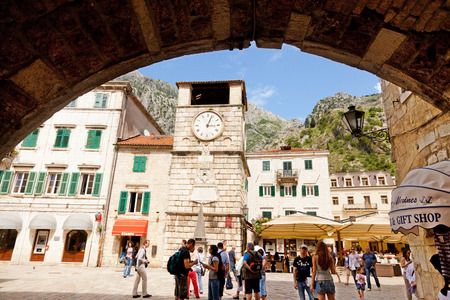 Kotor, Montenegro - May 26, 2012 : Young tourists walking around the old town of Kotor at the middle of the dayのeditorial素材