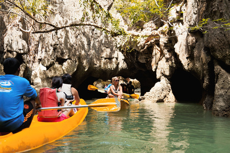 Pang Nga, Thailand - March 16, 2011 : Group of tourists kayaking in the hongs of Pang Nga Bayのeditorial素材