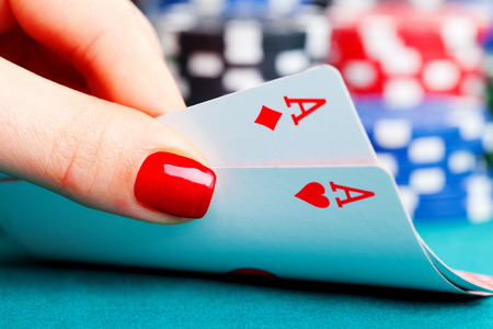 Two aces and gambling chipsの写真素材