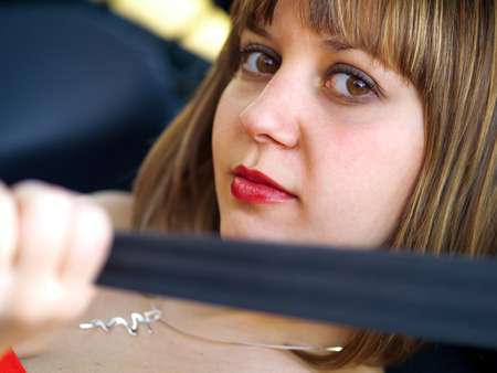 Beautiful driver with a beltの写真素材