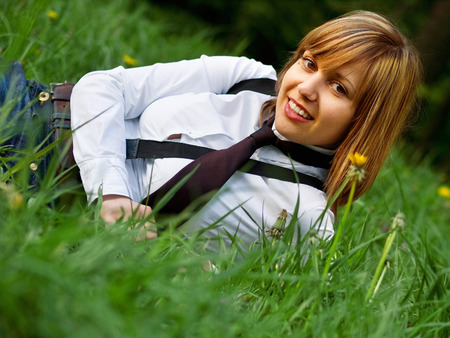 Woman in the grassの写真素材