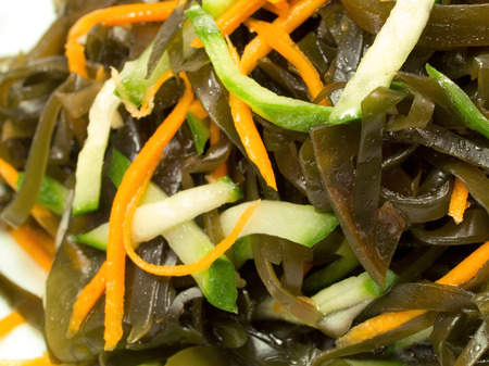 Chinese Seaweed Salad with Cucumbers and Carrotsの写真素材