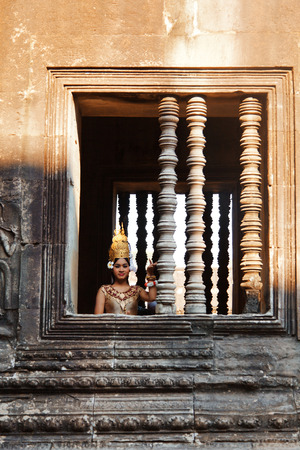 Angkor Wat, Cambodia - March 19, 2011 - Woman in traditional Cambodian clothing in Angkor Watのeditorial素材