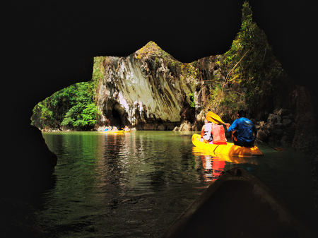 Pang Nga, Thailand - March 16, 2011 : Tourists kayaking in the hongs of Pang Nga Bay in the morning.のeditorial素材