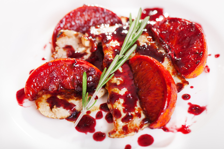 Turkey in orange sauce with cranberriesの写真素材