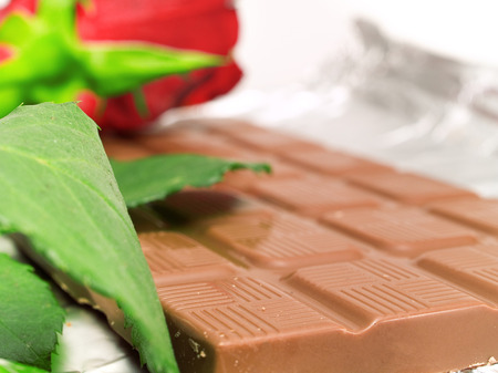 Chocolate and red roseの写真素材