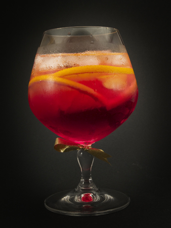 Ingredients:2 oz gin1 oz sweet Italian vermouth1 oz Campariorange slicesの写真素材
