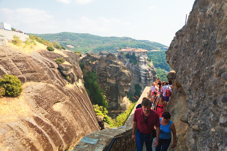 Meteora, Greece - September 08, 2012 : Tourists climbing the stairs to one of the monasteries in Meteoraのeditorial素材