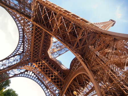 View of Eiffel Tower during the day from the park near the tower. Low angle view.の写真素材