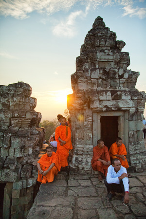 Angkor Wat, Cambodia - March 19, 2011 : Group cambodian buddhist monks at Angkor Wat at sunsetのeditorial素材