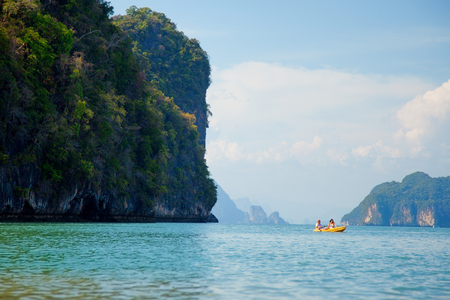 Pang Nga, Thailand - March 16, 2011 - Tourists kayaking in the hongs of Pang Nga Bay in the morning.のeditorial素材