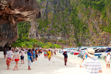 Maya Bay, Thailand - March 15, 2011 : Tourists relaxing in the waters of Maya Bay where the movie The Beach has been shot in the morning.のeditorial素材