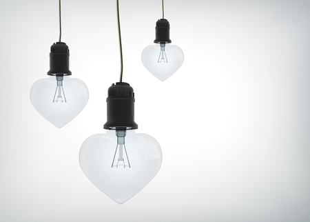 Light amorous design concept with realistic electric bulbs in heart shape hanging on wires isolated vector illustrationのイラスト素材