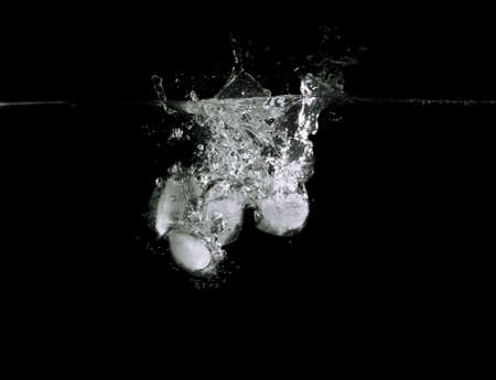 Ice Cubes splashの写真素材