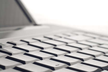 Laptop keyboard on white close upの写真素材