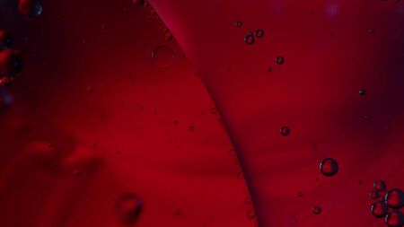 concept of scientific research, microbiology, red color reminiscent of blood and plasma fluids