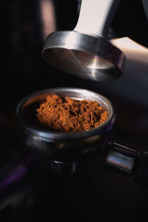Tempering of natural coffee. An important process for quality and tasty espresso.の写真素材