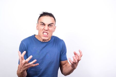Angry man. white background, medium shotの写真素材