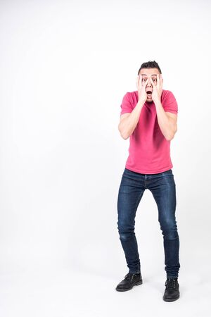 Scared man on white background, full bodyの写真素材