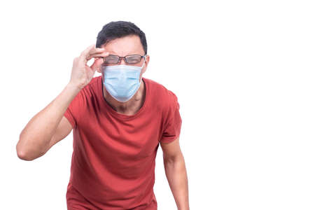 Man in medical mask and fogged up eyeglassesの写真素材