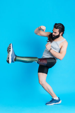 Man with a prosthetic leg kicking and fighting