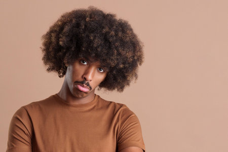 Sad african man looking at the cameraの写真素材