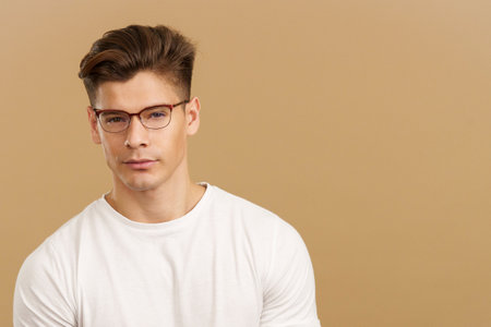 Handsome man with eyeglasses looking at cameraの写真素材