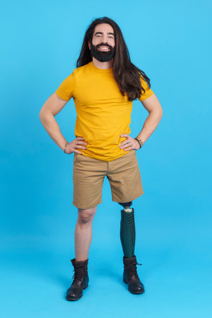 Man with a prosthesis on a leg smiling at cameraの写真素材