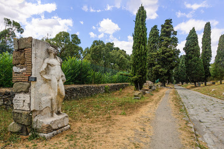 View of the Appian Way with statue of heroic nudeの写真素材